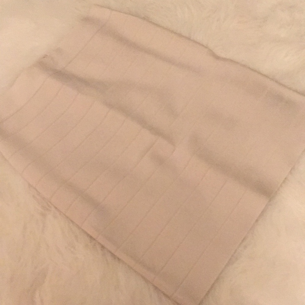 Never been worn Bebe bodycon skirt.
